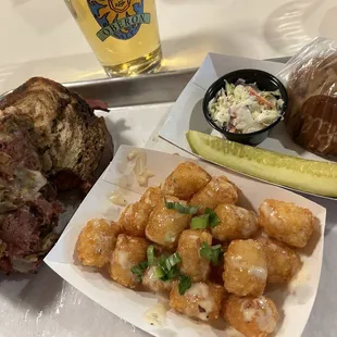 Traditional Ruben with garlic parm tots