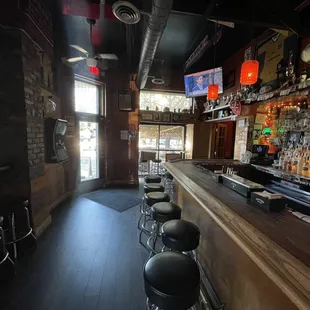 Downstairs bar facing door and patio