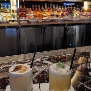 two cocktails on the bar