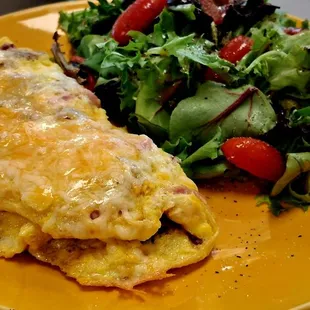 Meat lovers omelet.   I subbed salad instead of potatoes and toast to make it keto-friendly .  They were very accomodating!