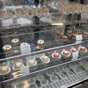 a display case full of cupcakes