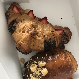 Chocolate hazelnut croissant and strawberry poppyseed croissant