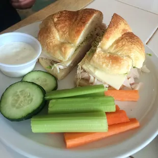 'C.S. Lewis' turkey, Monterey Jack, honey mustard and sprouts on croissant.