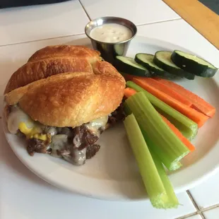 'The Circuit Rider' grilled roast beef &amp; onions, melted Swiss, mustard, mayo on a croissant. Yum!