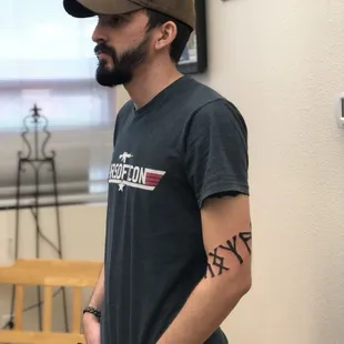 A Client waiting in the lobby at Solomon's Porch Tattoo Parlor.