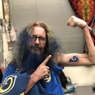 An Excited Rams Fan with His new Rams Tattoo at Solomon's Porch Tattoo Parlor. Rest in Peace Carl George.