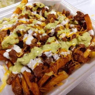 a tray of loaded fries
