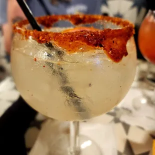 Original chispa with chamoy and tajin rim