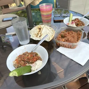 a glass table with food on it