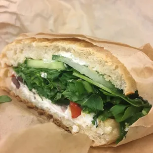 Goat Cheese sandwich w/ kalamata olives, fresh cucumber, arugula and red pepper