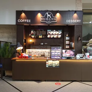 a coffee bar with a coffee machine