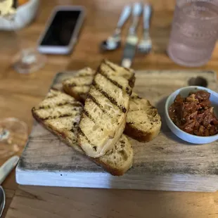 b r e a d house made grilled sourdough served with rotating seasonal spread