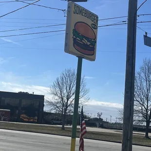 a sign on the corner of a street