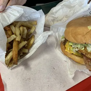 Excellent Double patty burger with bacon, sunny side up egg.