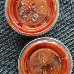 two jars of hot sauce