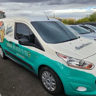 a van parked in a parking lot