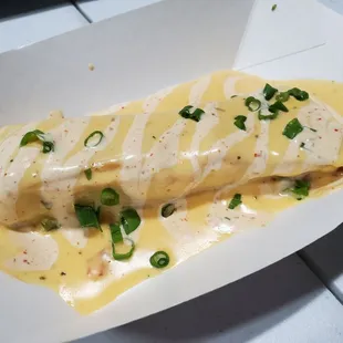 (12/26/21) ¡Feliz Tamalidad! ($4.50: special of the day. Tamale w/ queso, Somethin' Sauce, green onions