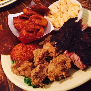 The Land &amp; Sea -- Baby Back Ribs, Fried Oysters, Crabcake, Onion Rings &amp; Mac n&apos; Cheese!  #Comatose!