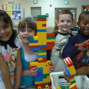Kids in out Preschool class build a tower