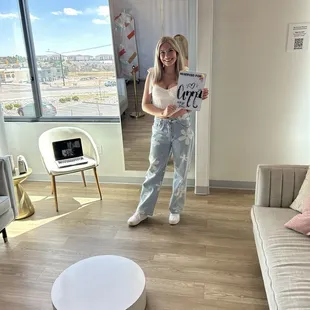 Me at my pick up appointment after ordering my dress. Everyone was so genuinely excited for me