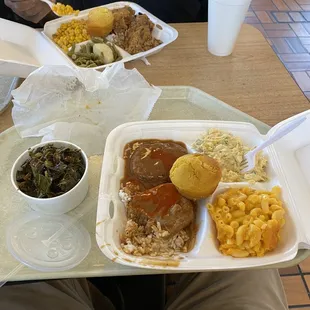 Salisbury steak with Mac and cheese, potato salad and a extra side of collards.