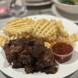 Pecan roasted chicken wings...YUMMY! If you&apos;re going to have a cheat day...dive in...I should have gotten some veggies tho. Oh well LOL.