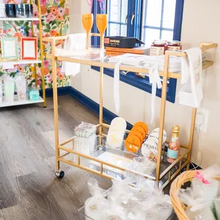 a bar cart filled with items