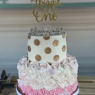 a birthday cake with a crown on top