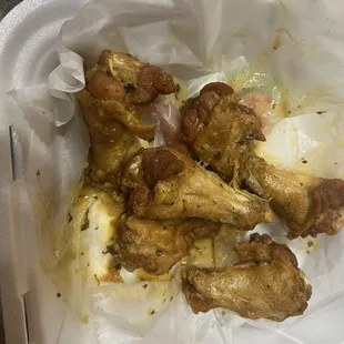 Undercooked and barely fried garlic parm wings