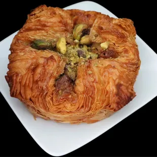 Pistachio Kouign Amann. Delicious! Buttery, flaky, nutty, and sweet.