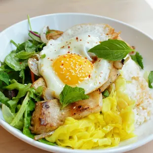 5-Spice Pork Belly &amp; Egg - Sushi rice, spring mix, sautéed onion, pickled vegetables, fresh herbs
