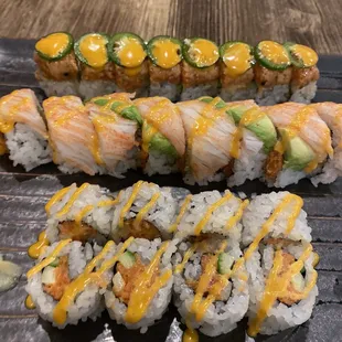 a variety of sushi rolls