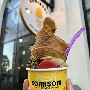 Oreo Soft Serve, Graham Cracker, Oreo Crumbs, Fruity Pebbles, Taiyaki filled with Taro, and Macaron