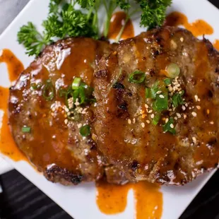 TTEOK GALBI Grounded pork meat patties mixed with a soy sauce seasoning and then grilled. Served with rice and miso soup.