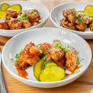 Bone in Chicken Wings (6)

Crispy wings tossed in a choice of three sauces: Sweet &amp; spicy, BBQ, or teriyaki