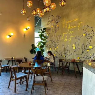 a woman sitting at a table