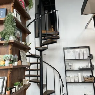 Spiral staircase leading upstairs. Astonishing interior.