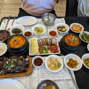 a table full of asian food