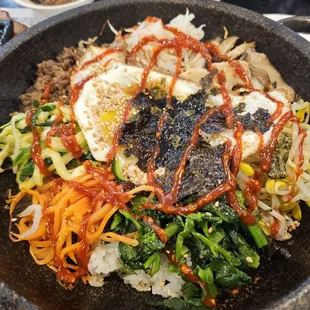 a plate of asian food on a table