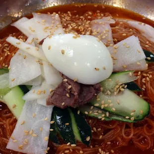 This place has the most authentic Korean Cold Spicy Noodle for hot summer days.