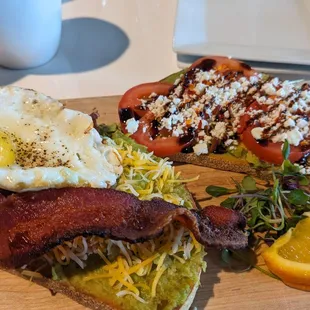 Avocado toast.  Tomato goat cheese, bacon egg.