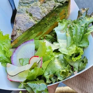 a person holding a plate of food