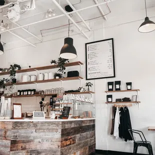 a wooden counter and shelves
