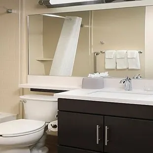 Spacious bathroom with large counter space and plenty of storage