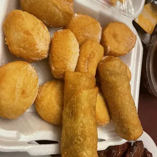 Fried donuts and pork egg rolls