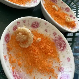 three plates of food on a table