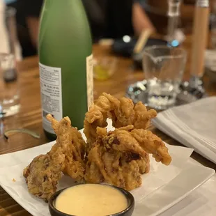 fried onion rings with dipping sauce