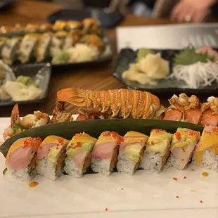 a long plate of sushi