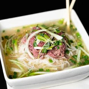 a bowl of beef soup