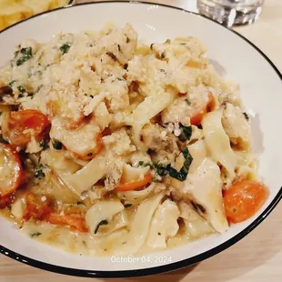 Ample portion of pasta that needed a couple shakes of salt and pepper.